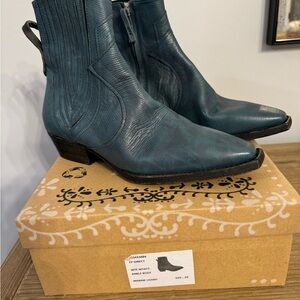 New in Box We The Free Wyatt Ankle Boot 
Rare color: Marine Lizard 
Size: 8 / 39